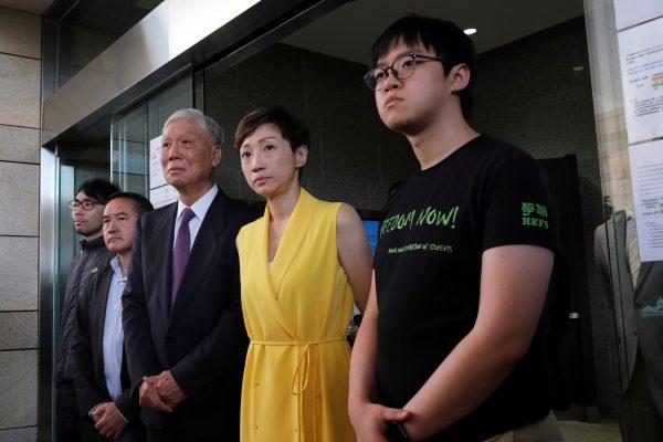 (L-R) Pro-democracy activists Chung Yiu-wa, Lee Wing-tat, Chu Yiu-ming, Tanya Chan, and Cheung Sau-yin leave the court after getting their suspended sentence for their involvement in the Occupy Central, also known as “Umbrella Movement,” in Hong Kong, China on April 24, 2019. (Tyrone Siu/Reuters)