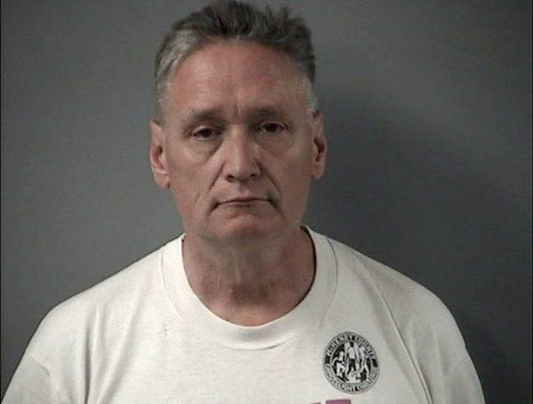 Andrew Freund Sr, who along with his wife Joann Cunningham, have been charged with murder and other charges in the death of their missing son Andrew "AJ" Freund , on April 24, 2019. (Crystal Lake Police Department via AP)