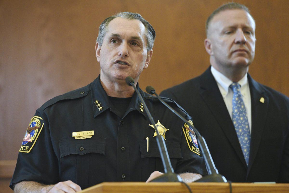 Police Chief James Black, left, and FBI Special Agent Jeffrey Sallet announce during a press conference that the parents of Andrew "AJ" Freund are responsible for his death, in Crystal Lake, Ill., on April 24, 2019. (Paul Valade/Daily Herald via AP)