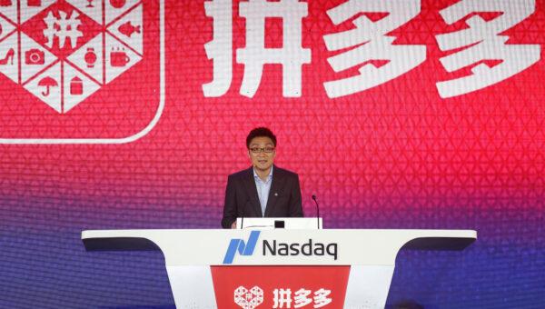 Colin Huang, founder and CEO of the online group discounter Pinduoduo, speaks during the company's stock trading debut at the Nasdaq Stock Market in New York, during an event in Shanghai on July 26, 2018. (Yin Liqin/CNS via Reuters)