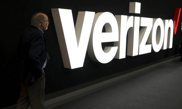 Verizon Raises Profit Forecast, Loses More Phone Subscribers