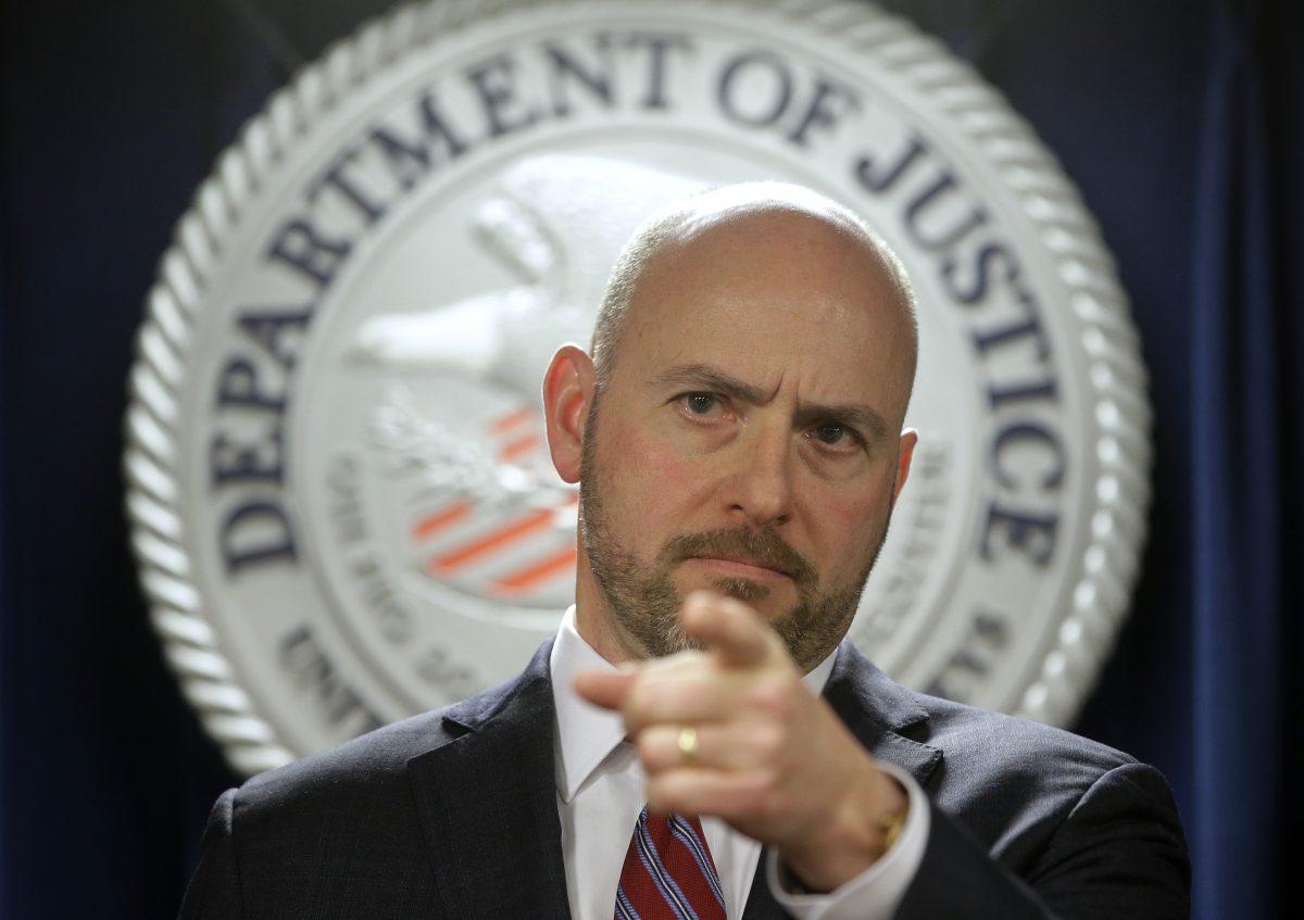 Andrew Lelling, U.S. Attorney for the District of Massachusetts, speaks during a news conference in Boston, on March 12, 2019. (Steven Senne/AP Photo)
