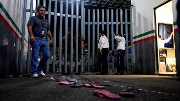 Private security guards are seen at the gate of the Siglo XXI immigrant detention center after a large group of Cubans, Haitians and Central Americans broke out and escaped the facilities, in Tapachula, Mexico on April 25, 2019. (Jose Torres/Reuters)