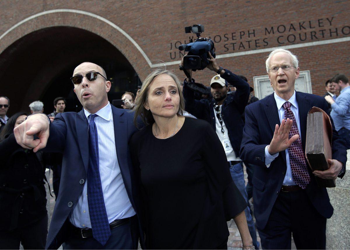 District Court Judge Shelley M. Richmond Joseph (C) departs federal court in Boston, on April 25, 2019, after facing obstruction of justice charges for allegedly helping a man in the country illegally evade immigration officials as he left her Newton, Mass., courthouse after a hearing in 2018. (Steven Senne/AP Photo)