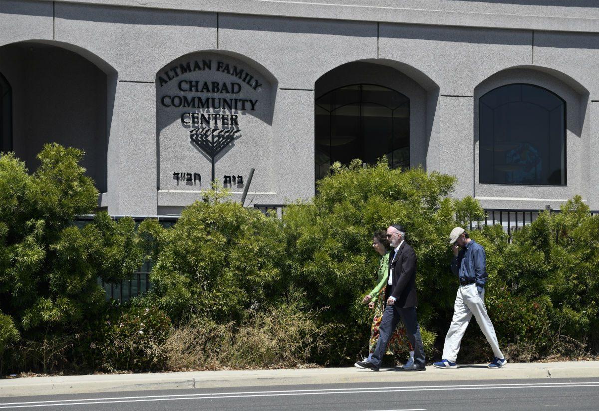 Synagogue members walk outside of the Chabad of Poway Synagogue in Poway, Calif., on April 27, 2019. (Denis Poroy/AP Photo)