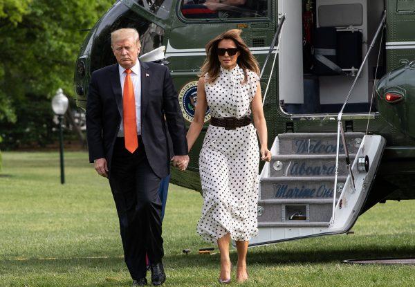 President Donald Trump and First Lady Melania Trump arrive at the White House in Washington on April 24, 2019. (Nicholas Kamm/AFP/Getty Images)