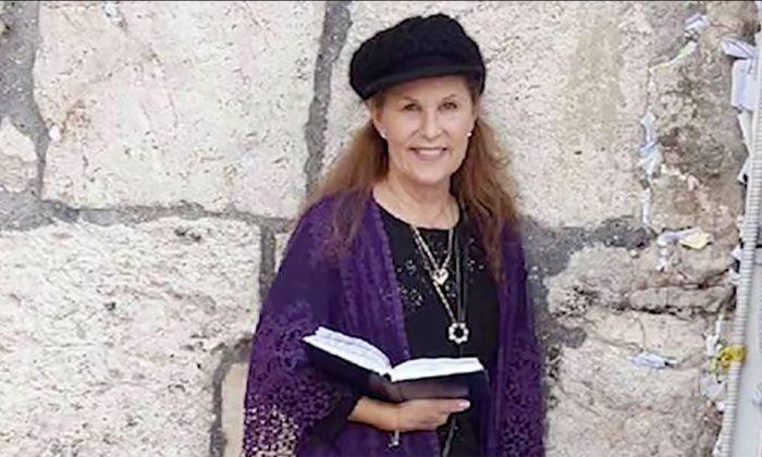 Woman Killed While Protecting Rabbi in Synagogue Shooting