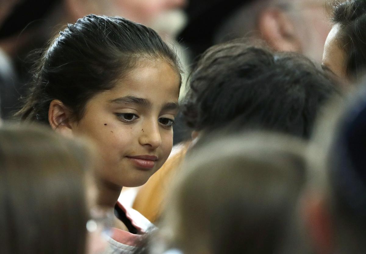 Noya Dahan, 8, attends the funeral for Lori Kaye, at the Chabad of Poway synagogue in Poway, Calif., on April 29, 2019. (Gregory Bull/The Associated Press)