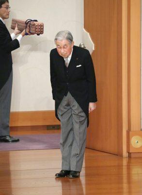 Japan's head of state Akihito bows before leaving after the abdication ceremony at the Imperial Palace in Tokyo, Tuesday, April 30, 2019. The 85-year-old Akihito ends his three-decade reign on Tuesday. (Japan Pool via The Associated Press)