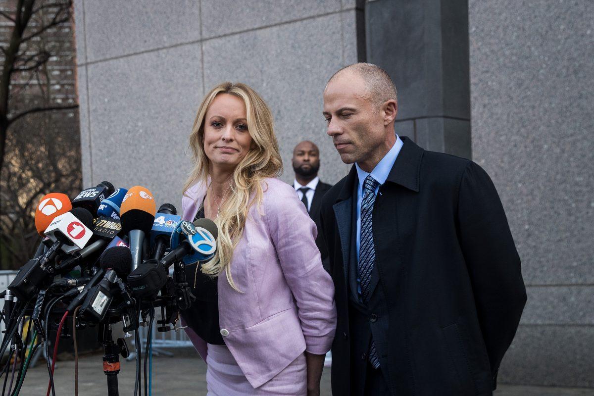 (L to R) Porn actress Stormy Daniels (Stephanie Clifford) and Michael Avenatti, attorney for Stormy Daniels, speak to the media as they exit the United States District Court Southern District of New York for a hearing related to Michael Cohen, President Trump's longtime personal attorney and confidante, in New York City on April 16, 2018. (Drew Angerer/Getty Images)