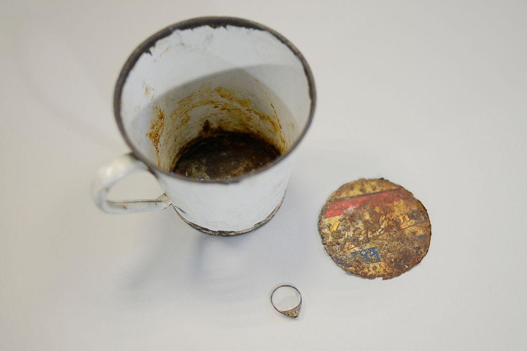 A gold ring that was found by curators of Auschwitz - Birkenau Museum in a metal mug with the double bottom is pictured on May 19, 2016, in Oswiecim. (©Getty Images | <a href="https://www.gettyimages.com/detail/news-photo/gold-ring-that-was-found-by-curators-of-auschwitz-birkenau-news-photo/532588036">BARTOSZ SIEDLIK</a>)