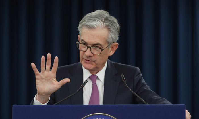 Powell Indicates Fed May Cut Rates If Trade War Heats Up