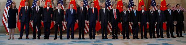 Members of U.S. and China delegation lead by Chinese Vice Premier Liu He, U.S. Treasury Secretary Steven Mnuchin and U.S. Trade Representative Robert Lighthizer stand for a group photo session after their meeting at the Diaoyutai State Guesthouse in Beijing on May 1, 2019. (Andy Wong/Pool via Reuters)
