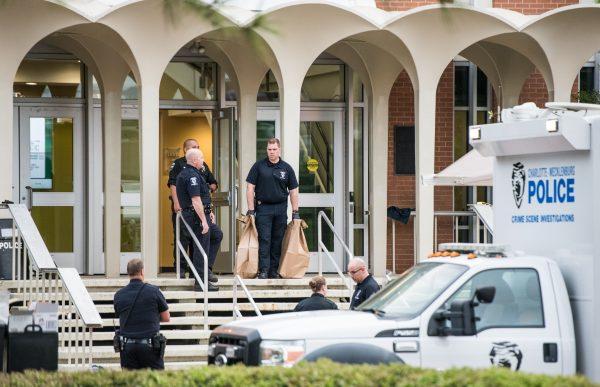 Charlotte-Mecklenburg law enforcement in front of the Kennedy building where a gunman killed two people and injured four students at UNC Charlotte in Charlotte, N.C., on May 1, 2019. (Sean Rayford/Getty Images)
