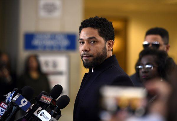 Actor Jussie Smollett talks to the media before leaving Cook County Court after his charges were dropped, in Chicago, on March 26, 2019. (AP Photo/Paul Beaty, File)