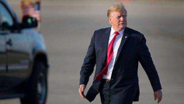 US President Donald Trump walks to speak with supporters after arriving on Air Force One at the Palm Beach International Airport in West Palm Beach, FL, on April 18, 2019. (Joe Raedle/Getty Images)