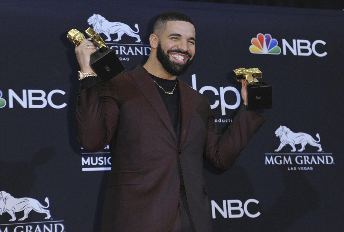 Drake poses in the press room with his awards at the Billboard Music Awards at the MGM Grand Garden Arena in Las Vegas, on May 1, 2019. (Richard Shotwell/Invision/AP)