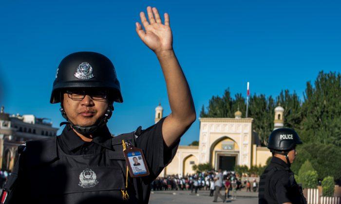 Police Surveillance App in Xinjiang Targets 36 Types of ‘Problematic’ People, Report Says