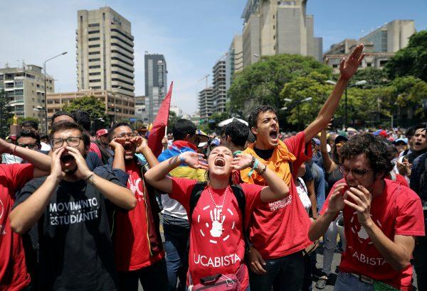 Supporters of Venezuelan opposition leader Juan Guaido, who many nations have recognised as the country's rightful interim ruler, take part in a rally against the government of Venezuela's Nicolas Maduro and to commemorate May Day in Caracas, Venezuela, on May 1, 2019. (Manaure Quintero/Reuters)