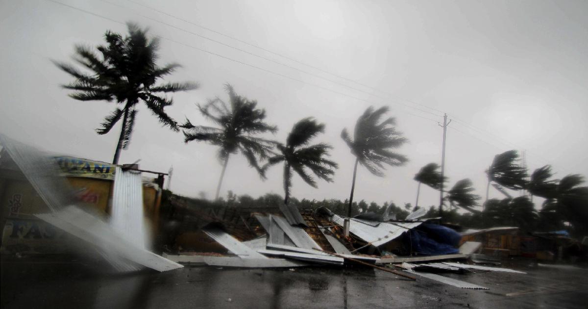 Street shops are seen collapsed due to gusty winds preceding the landfall of cyclone Fani on the outskirts of Puri, in the Indian state of Odisha, Friday, May 3, 2019. (AP Photo)
