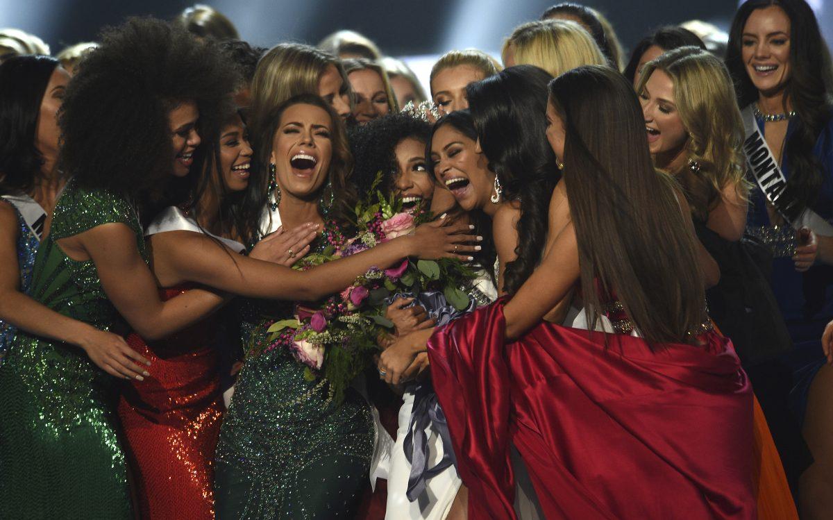 Miss North Carolina Cheslie Kryst (C) in crown, wins the 2019 Miss USA final competition in Reno, Nev., on May 2, 2019. (Jason Bean/The Reno Gazette-Journal via AP)
