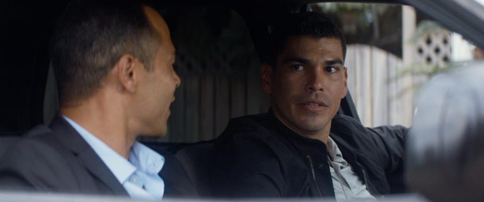 Raúl Castillo (R) plays LAPD Detective Diego Hernandez. (Briarcliff Entertainment)