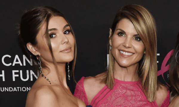 Actress Lori Loughlin poses with her daughter Olivia Jade Giannulli (L) in Beverly Hills, Calif., on Feb. 28, 2019. (Chris Pizzello/Invision/AP)