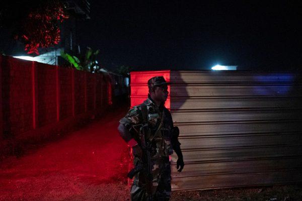 A soldier stands guard outside a training camp allegedly linked to Islamist extremists, in Kattankudy near Batticaloa, Sri Lanka, on May 5, 2019. (Danish Siddiqui/Reuters)