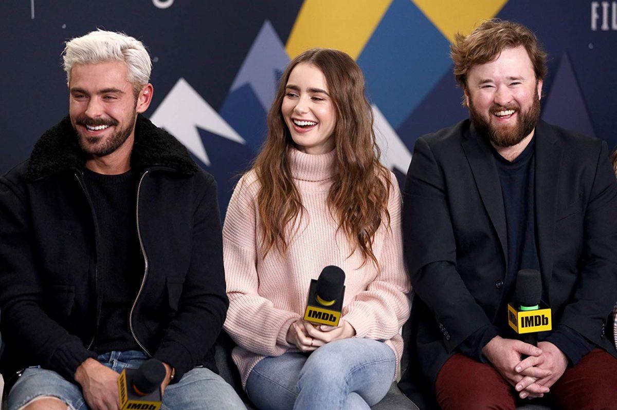 (L–R) Zac Efron, Lily Collins, and Haley Joel Osment at an event for “Extremely Wicked, Shockingly Evil and Vile.” (Neilson Barnard/Getty Images/Netflix)