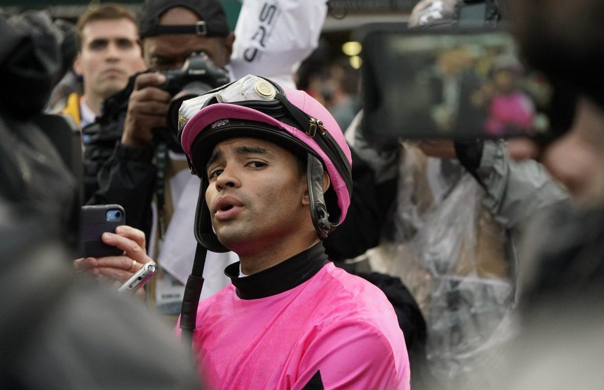 Luis Saez reacts after Maximum Security was disqualified from the 145th running of the Kentucky Derby horse race at Churchill Downs, in Louisville, Ky., on May 4, 2019. (Morry Gash/AP Photo)