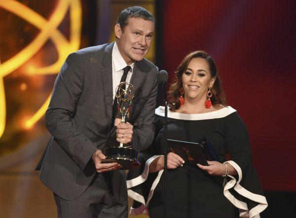 Alan Tacher, left, and Glicia Marquez-Pronesti accept the award for outstanding morning program in Spanish for "Despierta America" at the 46th annual Daytime Emmy Awards at the Pasadena Civic Center in Pasadena, Calif., on May 5, 2019. (Chris Pizzello/Invision/AP)
