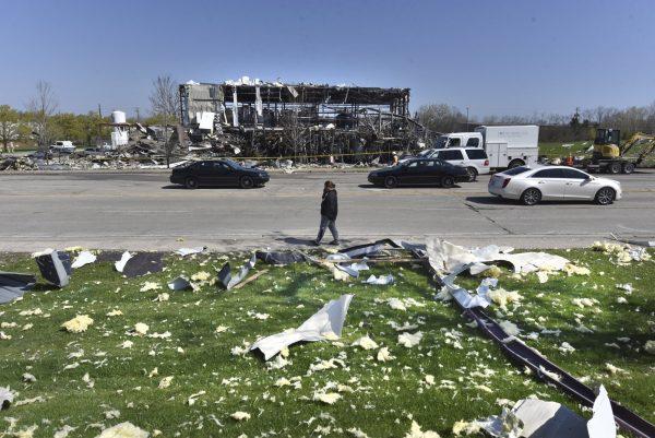 Debris is scattered across the street at the scene of an explosion at AB Specialty Silicones on Sunset Ave. and Northwestern Ave. on the border between Gurnee, Ill., and Waukegan. (John Starks/Daily Herald via AP)