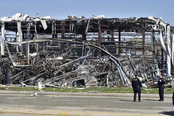 Emergency personnel work at the scene of an explosion at AB Specialty Silicones on Sunset Ave. and Northwestern Ave. on the border between Gurnee, Ill., and Waukegan. (John Starks/Daily Herald via AP)
