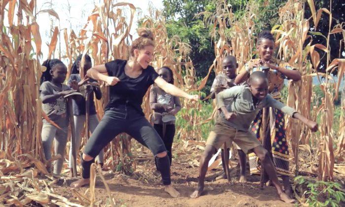 Girl Dances With African Kids