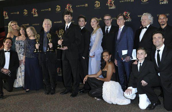 The cast and crew of "The Young and the Restless" pose in the press room with the award for outstanding drama series at the 46th annual Daytime Emmy Awards at the Pasadena Civic Center in Pasadena, Calif., on May 5, 2019. (Richard Shotwell/Invision/AP)
