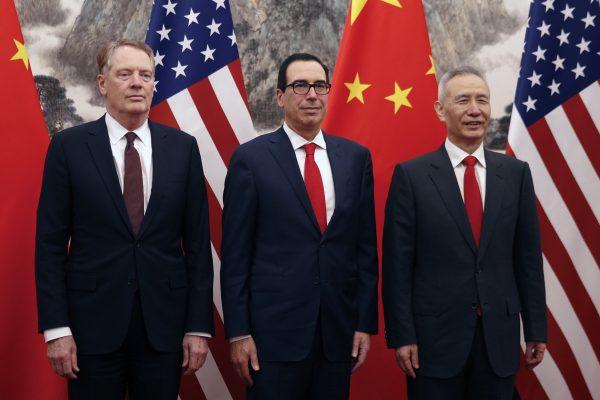 Chinese Vice Premier Liu He (R), U.S. Treasury Secretary Steven Mnuchin (C), and Trade Representative Robert Lighthizer pose before they proceed to their meeting at the Diaoyutai State Guesthouse in Beijing on May 1, 2019. (ANDY WONG/AFP/Getty Images)