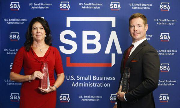 Small Business Person of the Year award recipients Jennifer Herbert, CEO, and Jeff Herbert, chief strategic officer of Superstition Meadery, from Prescott Ariz., with their awards at the U.S. Institute of Peace in Washington on May 6, 2019. (Samira Bouaou/The Epoch Times)