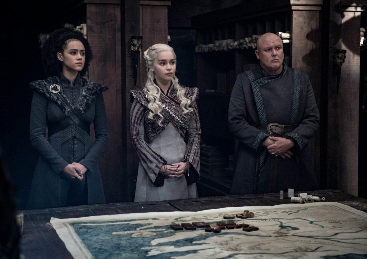 From left, Nathalie Emmanuel, Emilia Clarke and Conleth Hill in a scene from "Game of Thrones," that aired on May 5, 2019. (Helen Sloan/HBO via AP)