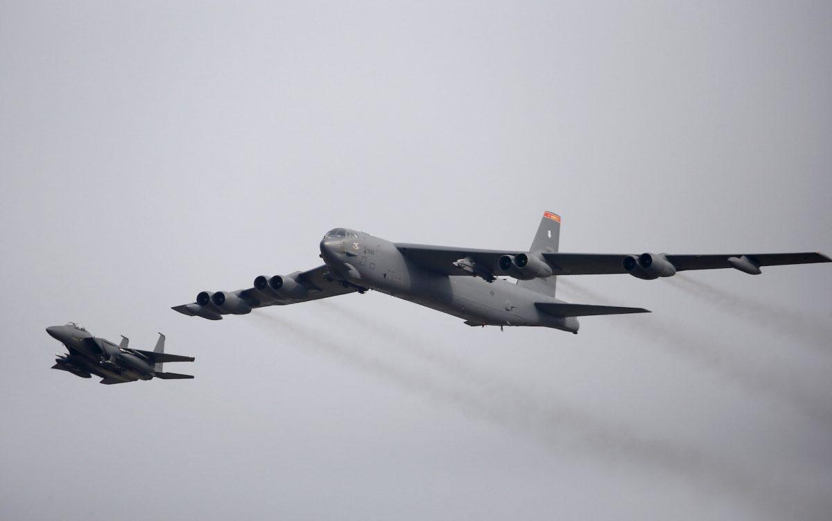 A U.S. Air Force B-52 (R) flies over Osan Air Base in Pyeongtaek, South Korea, January 10, 2016. (Reuters/Kim Hong-Ji/File Photo)