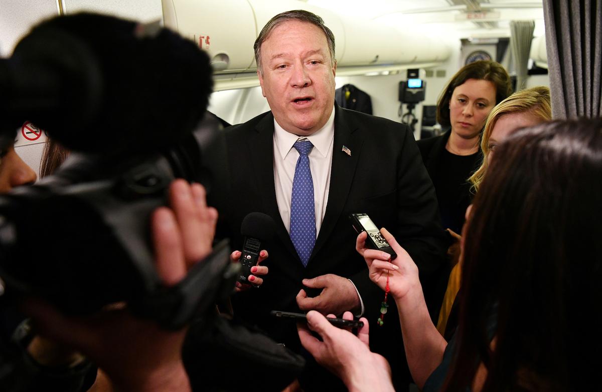 U.S. Secretary of State Mike Pompeo speaks to reporters in flight after a previously unannounced trip to Baghdad, Iraq, May 8, 2019. (Mandel Ngan/Pool via Reuters)