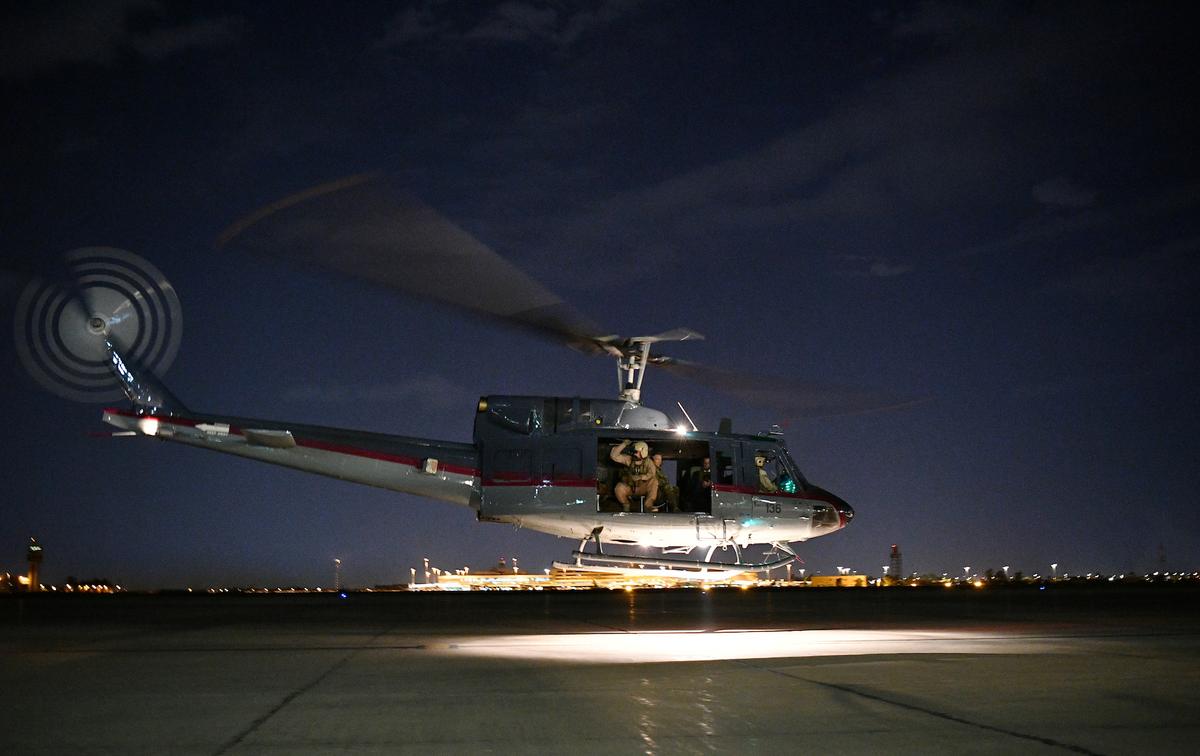 A helicopter carrying U.S. Secretary of State Mike Pompeo takes off from Baghdad International Airport in Baghdad, Iraq May 7, 2019. (Mandel Ngan/Pool via Reuters)
