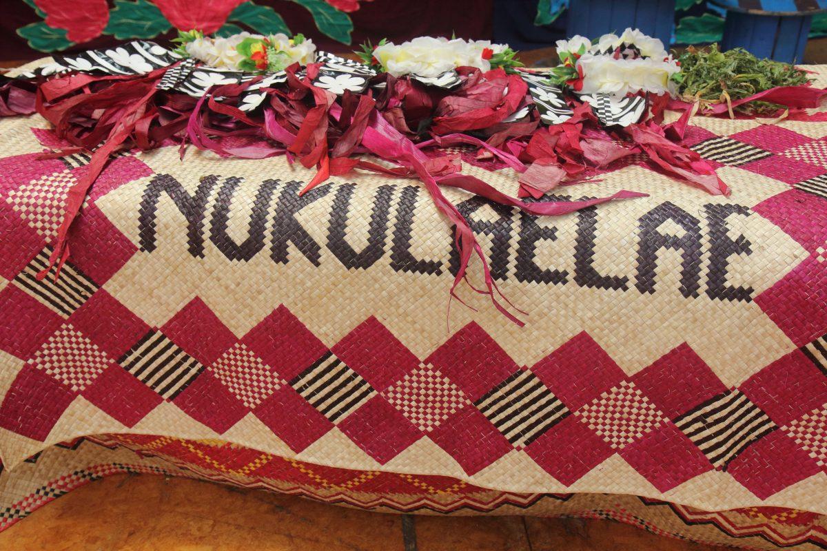 Nukulaelae, one of the nine coral islands of Tuvalu, shows some of its island crafts. At the front of the mat is a "titi tao," a decorative overskirt that is worn over the pandanus skirt called the "titi lama," which is worn for dancing the "fatele." (Lorraine Ferrier/The Epoch Times)