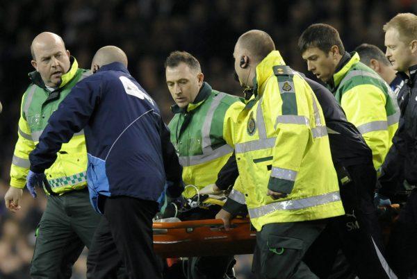 Bolton's English midfielder Fabrice Muamba is stretchered from the pitch at White Hart Lane in north London after collapsing during a match on March 17, 2012. (Olly Greenwood/AFP/Getty Images)