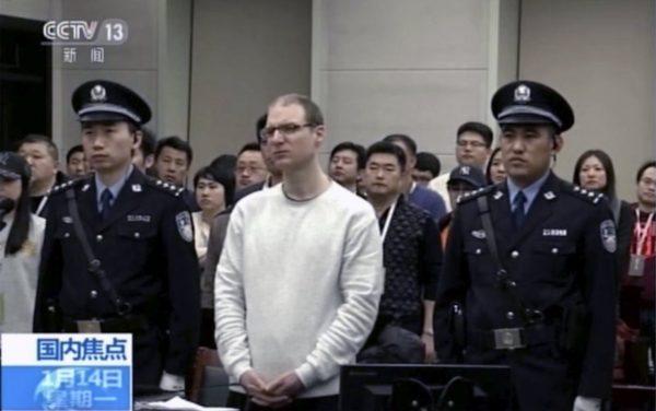 Canadian Robert Lloyd Schellenberg attends his retrial at the Dalian Intermediate People's Court in Dalian, northeastern China's Liaoning Province, on Jan. 14, 2019. (CCTV via AP)