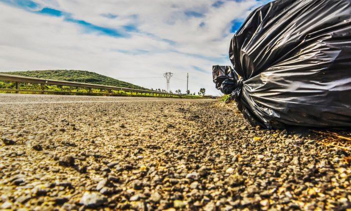 Kentucky Woman Notices a Trash Bag on the Side of Road. Then Realizes, It’s Moving