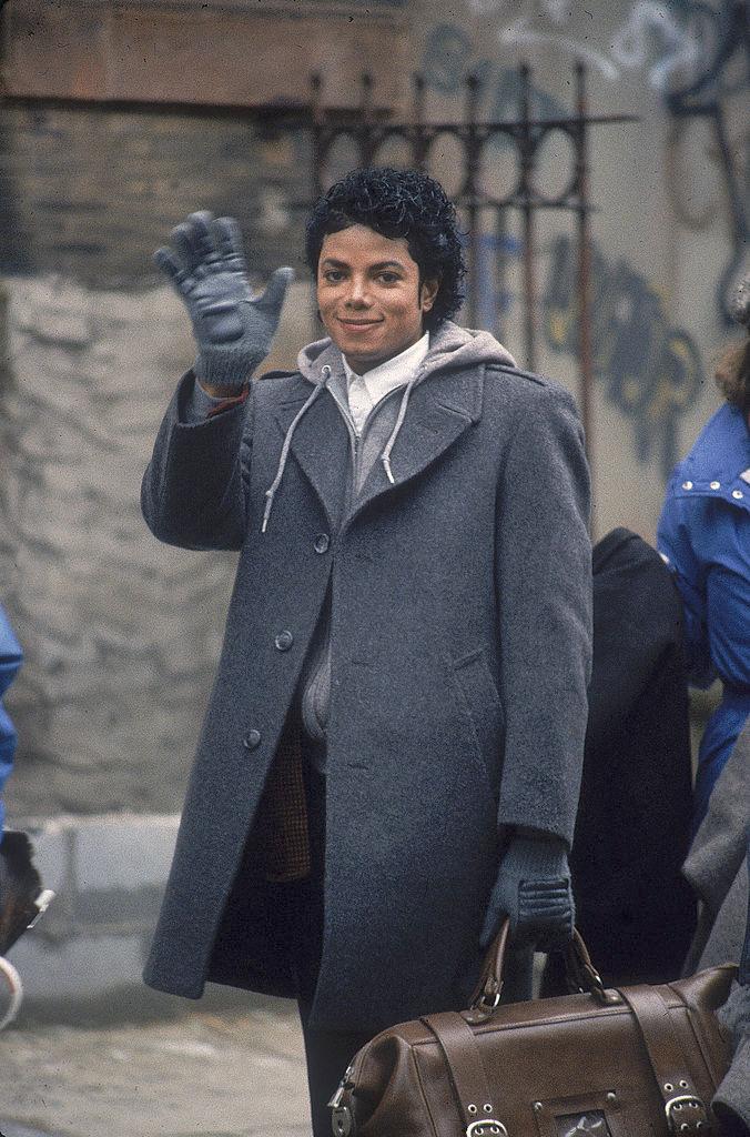 ©Getty Images | <a href="https://www.gettyimages.com/detail/news-photo/popular-american-musician-michael-jackson-waves-during-the-news-photo/88703655?adppopup=true">Hulton Archive</a>