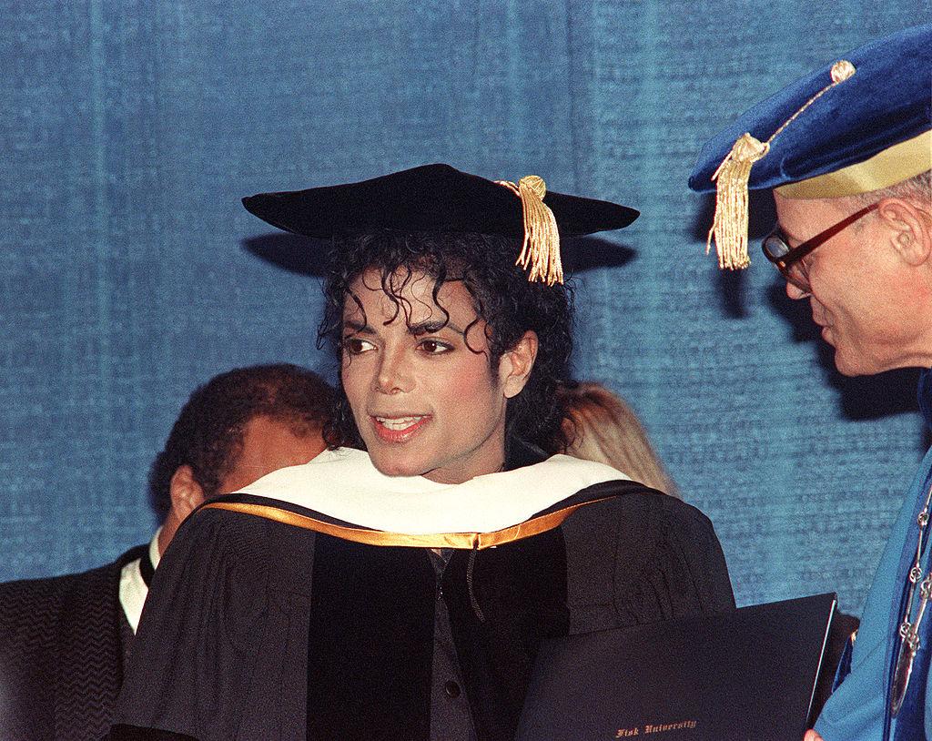 U.S. pop star and entertainer Michael Jackson grins after being awarded an Honorary Doctor of Humanities degree from Fisk University for his service to the United Nego College Fund on March 10, 1988, in New York. (©Getty Images | <a href="https://www.gettyimages.com/detail/news-photo/pop-star-and-entertainer-michael-jackson-grins-after-being-news-photo/147100555?adppopup=true">AFP</a>)