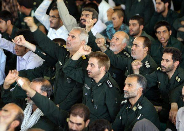 Members of the Iranian revolutionary guards shout anti-Israeli and anti-US slogans during the weekly Friday prayers at Tehran University in the Iranian capital on July 16, 2010. (Atta Kenare/AFP/Getty Images)
