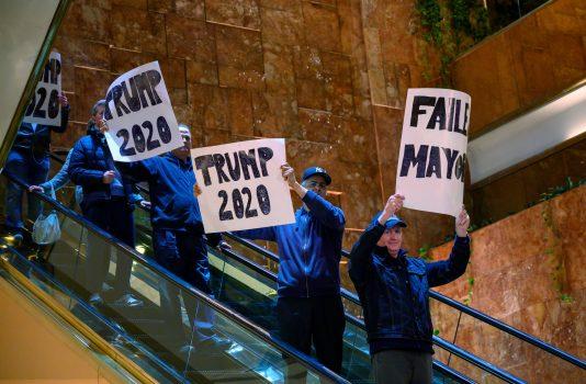 Trump supporters protest as New York City Mayor Bill de Blasio speaks inside Trump Tower about the Green New Deal on May 13, 2019, in New York. (Don Emmert/AFP/Getty Images)