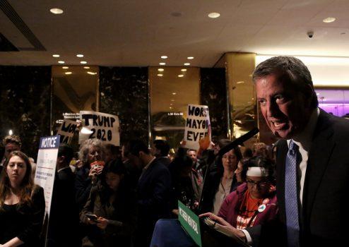 Protesters gather as Mayor Bill de Blasio holds a Green New Deal rally at Trump Tower in New York City on May 13, 2019. (Yana Paskova/Getty Images)